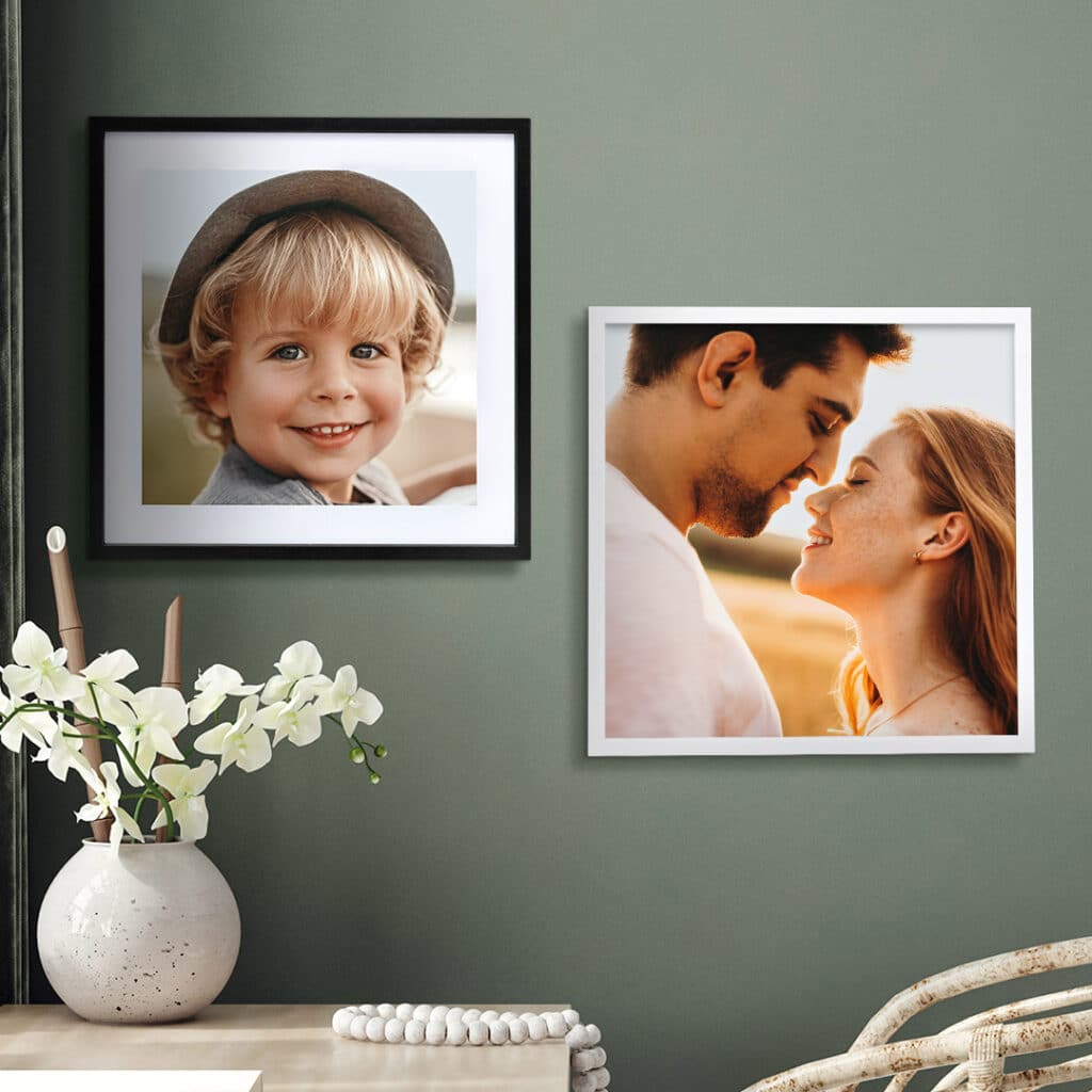A pair of framed photo tiles on a wall