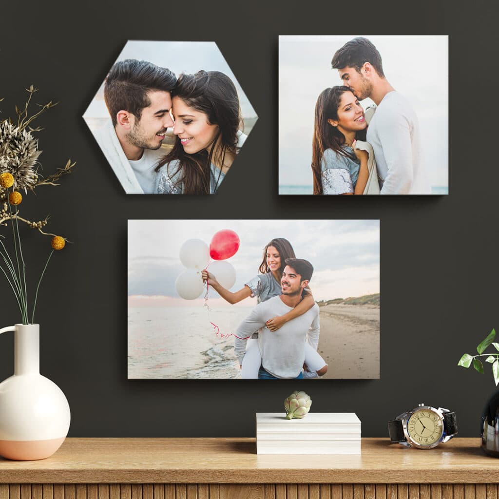 Photo tiles displayed on a wall in various shapes and sizes