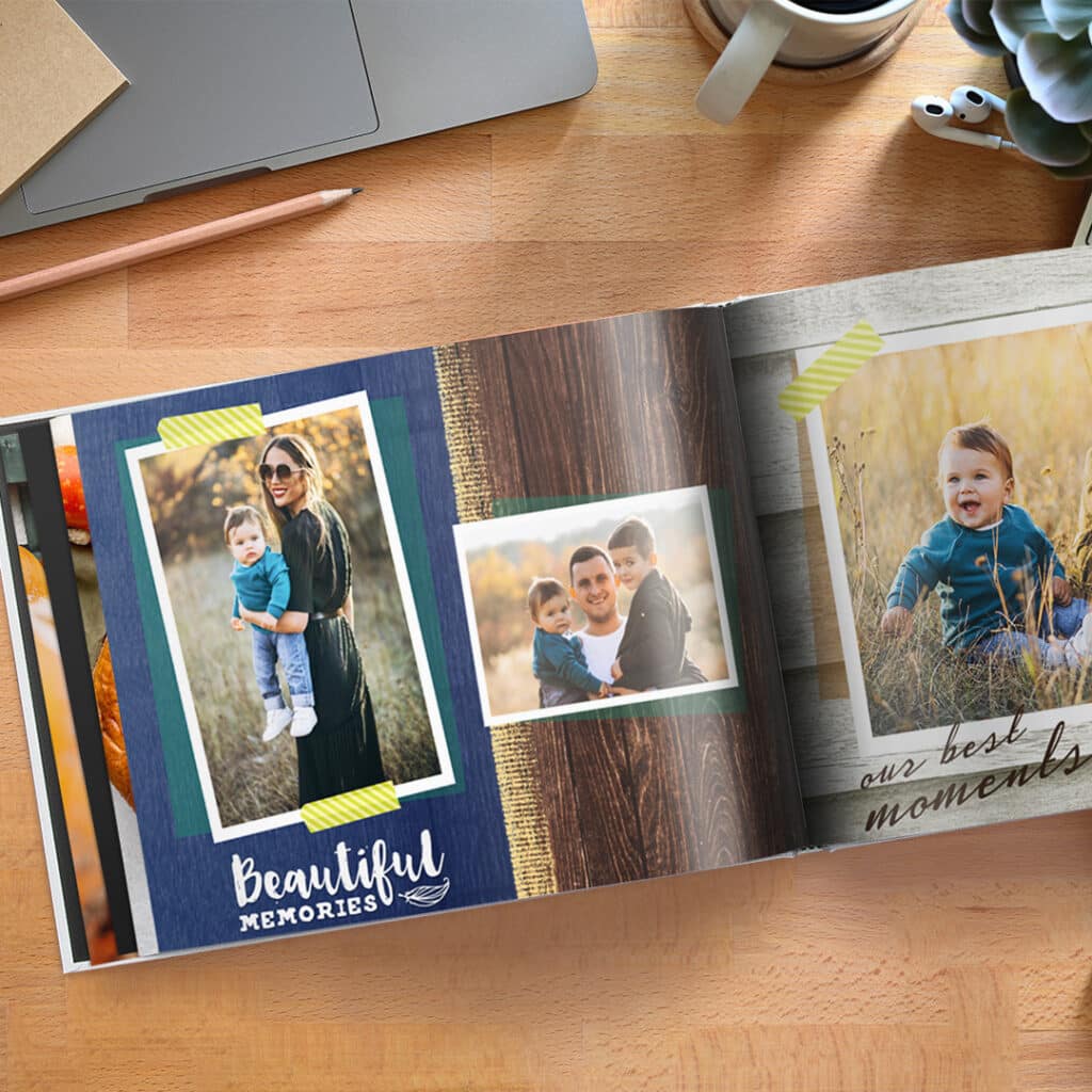 An open photobook with selection of family photos